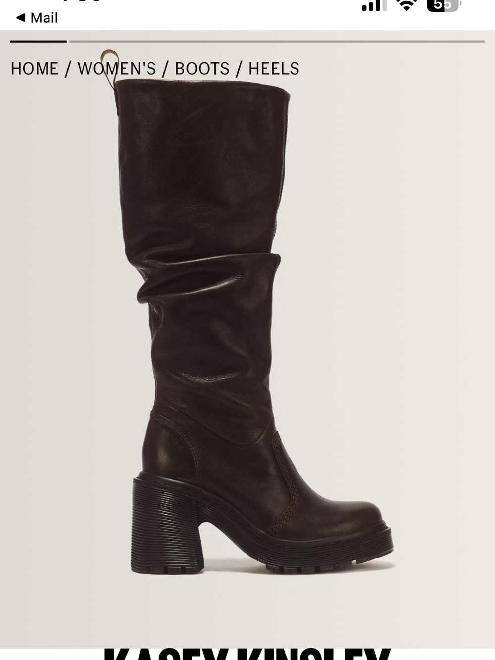 KASEY KINSLEY
LEATHER KNEE HIGH HEELED BOOTS